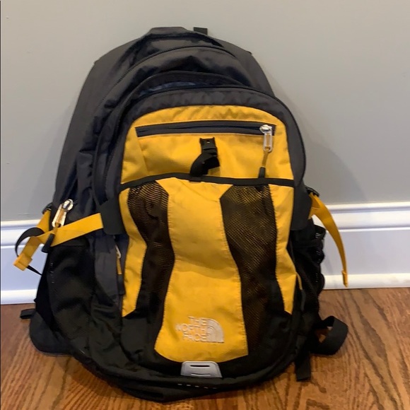 light yellow north face backpack
